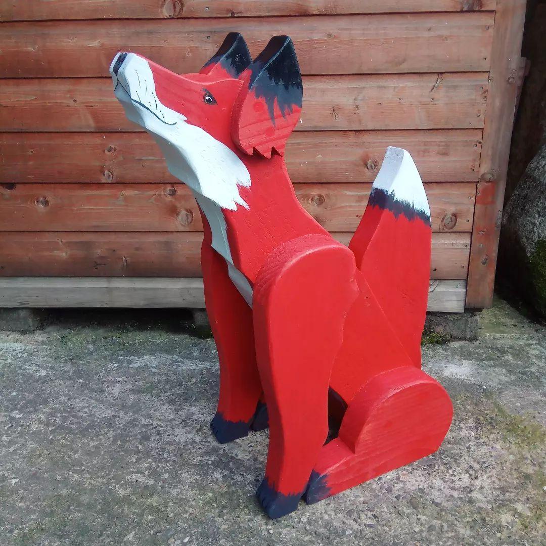 Hand carved wooden fox,